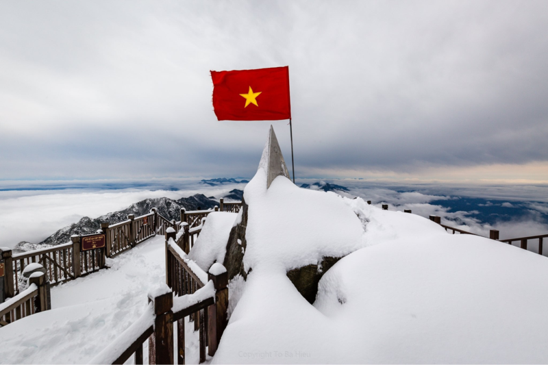 Fansipan Peak is covered with snow