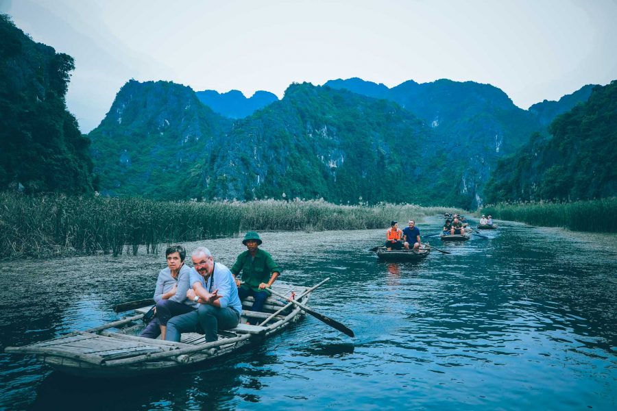 Take a boat to explore the natural beauty around Van Long Lagoon