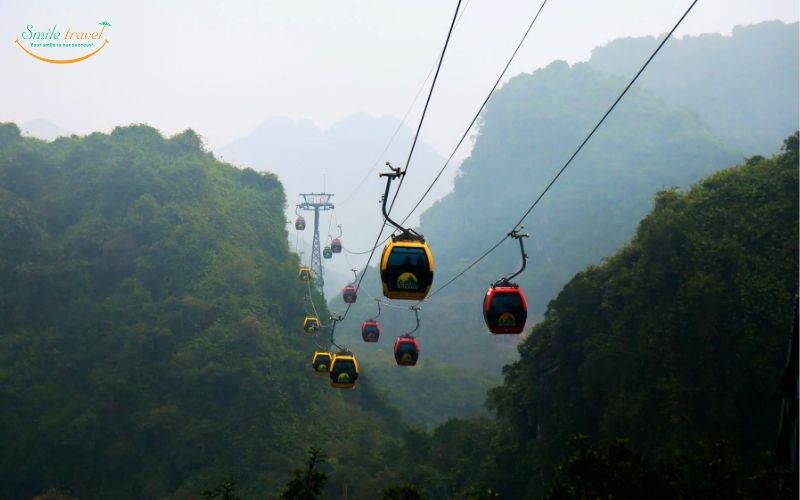 Taking cable car to Huong Tich cave