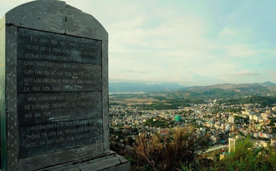 Historical stone tablet on top of mountain