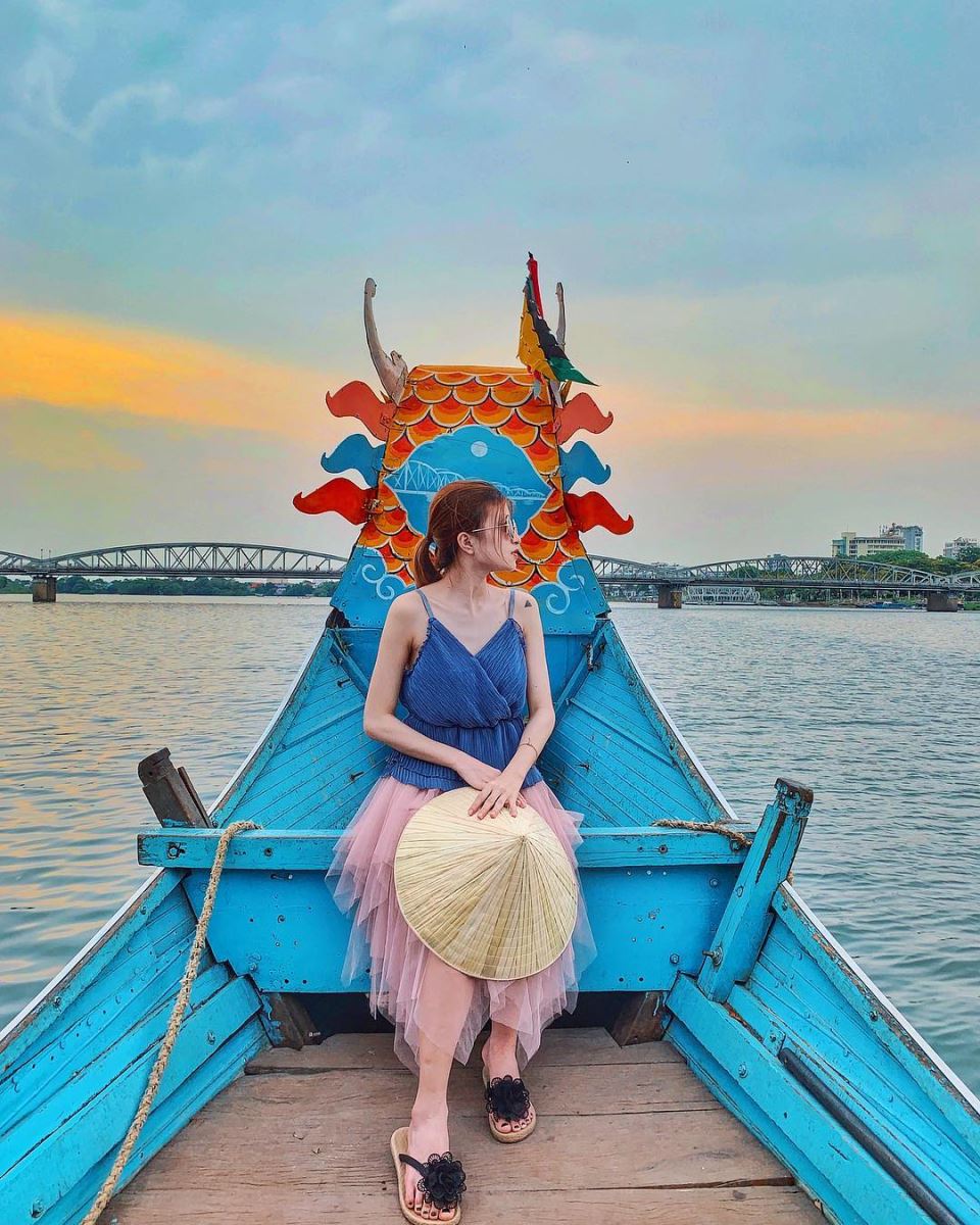 Taking a boat to fully explore Perfume River