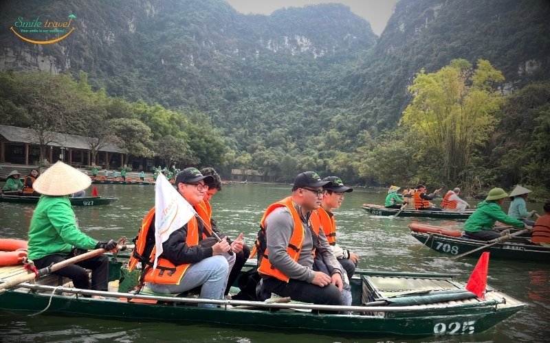 Tourists of Smile Travel participate in kayaking in Halong Bay