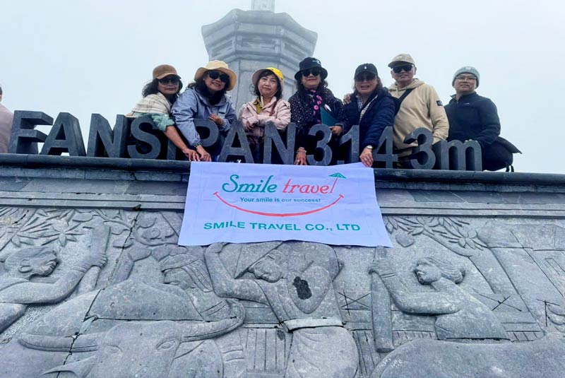 Smile Travel's client group at Fansipan Peak